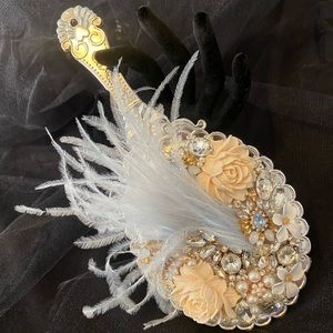 Decorated hand held mirror